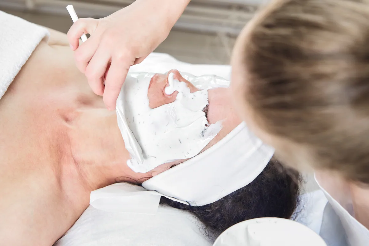 An esthetician at work